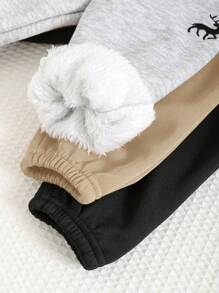 SHEIN 3pcs/Set Baby Boy Cute Solid Color Thick Thermal Lined Cartoon Dinosaur Pattern Elastic Waist Pants, Multi-Pack Basic Trousers Suitable For Autumn, Winter, Outdoor & Skiing