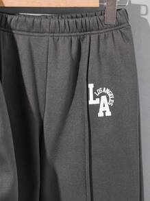 Set de 2 piezas de sudadera con cuello redondo con estampado gráfico de letras y pantalones jogger de ajuste relajado para niños/preadolescentes, adecuado para la escuela, el jardín, la playa, el cumpleaños, primavera/verano/otoño/invierno