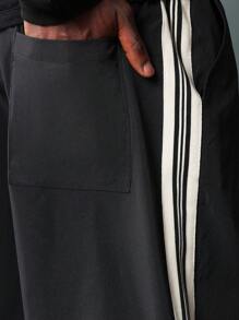 SUMWON Pantalones ajustados de campana de nailon con detalles de cinta