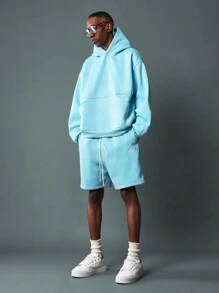 SUMWON Conjunto de 2 piezas con sudadera con capucha ajustada regular y pantalón corto de caída de entrepierna con patrón bordado - Celeste - Ver 1