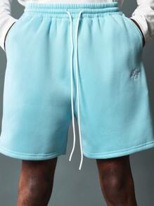 SUMWON Conjunto de 2 piezas con sudadera con capucha ajustada regular y pantalón corto de caída de entrepierna con patrón bordado - Celeste - Ver 7