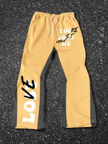 Manfinity EMRG 男式字母印花休闲前系带口袋运动裤 - 黃色 - 查看 1