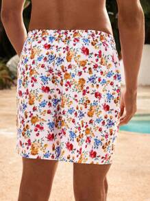 Manfinity VDAYZ 1 pieza Pantalones cortos casuales de playa con cordón en la cintura, estampado floral de estilo casual, traje de baño a juego para parejas, hawaiano