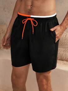 Manfinity Swimmode Contrasterende patchwork strandshorts met vetersluiting voor heren, vakantie, Hawaïaans