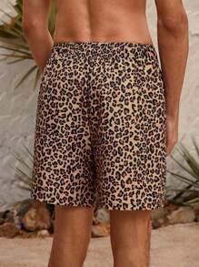Manfinity VDAYZ Shorts de playa con estampado de leopardo y cordón a la cintura, con estilo hawaiano, para hombre