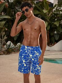 Manfinity VDAYZ 1 pieza Pantalón corto de playa holgado con estampado de planta tropical y cordón en la cintura para hombres, traje de baño a juego para parejas, estilo hawaiano