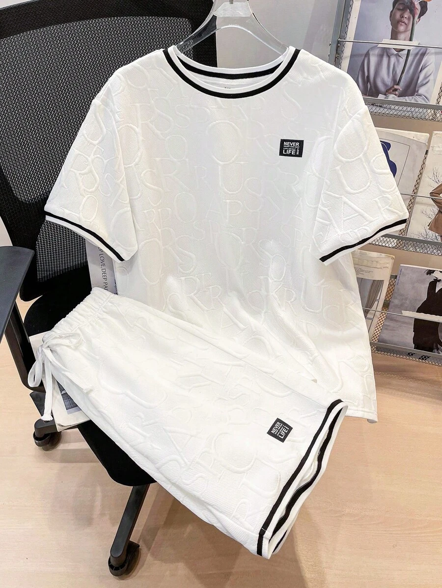 SHEIN Leap Crew 2 件青少年男孩休闲短袖 T 恤和短裤套装，街头朋克摇滚风格，适合日常穿着、派对、音乐节，适合春夏季，白色纹理英文图案面料 - 白色 - 查看 1