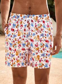 Manfinity VDAYZ 1 pieza Pantalones cortos casuales de playa con cordón en la cintura, estampado floral de estilo casual, traje de baño a juego para parejas, hawaiano