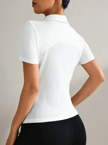 SHEIN Sport Studio Camisa polo deportiva casual de manga corta y unicolor para mujer