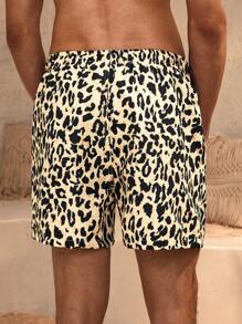 Manfinity VDAYZ 1 pièce Short de plage décontracté pour hommes avec imprimé léopard, cordon de serrage à la taille et poches. Short de bain assorti pour couples, vacances