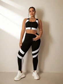 Rhythm Era 2-teiliges Trainingsanzug Set in Große Größen, Schwarz-Weiß Patchwork Sport-BH mit Reißverschluss und funktionale farblich abgesetzte Leggings Trainingsset für Frauen