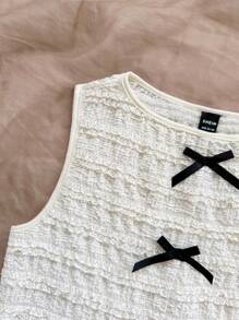 Soleia Top sin mangas de punto texturizado beige con lazo decorativo en la parte delantera y trasera con aberturas laterales, para fiestas y uso casual en resorts