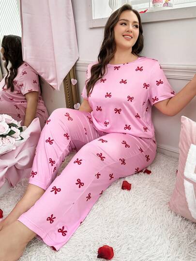 Conjunto de pijama de talla grande con top de manga corta estampado con moños y pantalones