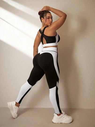 Easithlete Plus Size 2st Activewear-set, svart och vitt lapptäcke med zip-up sport-bh och funktionella färgblock-leggings träningsset för kvinnor