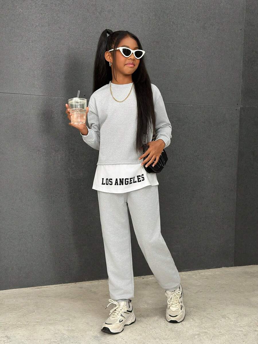 SHEIN Conjunto de chándal de niña preadolescente con parte superior de manga larga con cuello redondo y estampado de letras y colores en bloque, y pantalones de cintura elástica