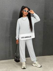 SHEIN Conjunto de chándal de niña preadolescente con parte superior de manga larga con cuello redondo y estampado de letras y colores en bloque, y pantalones de cintura elástica