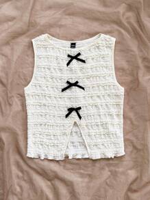 Soleia Top sin mangas de punto texturizado beige con lazo decorativo en la parte delantera y trasera con aberturas laterales, para fiestas y uso casual en resorts