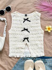 Soleia Top sin mangas de punto texturizado beige con lazo decorativo en la parte delantera y trasera con aberturas laterales, para fiestas y uso casual en resorts