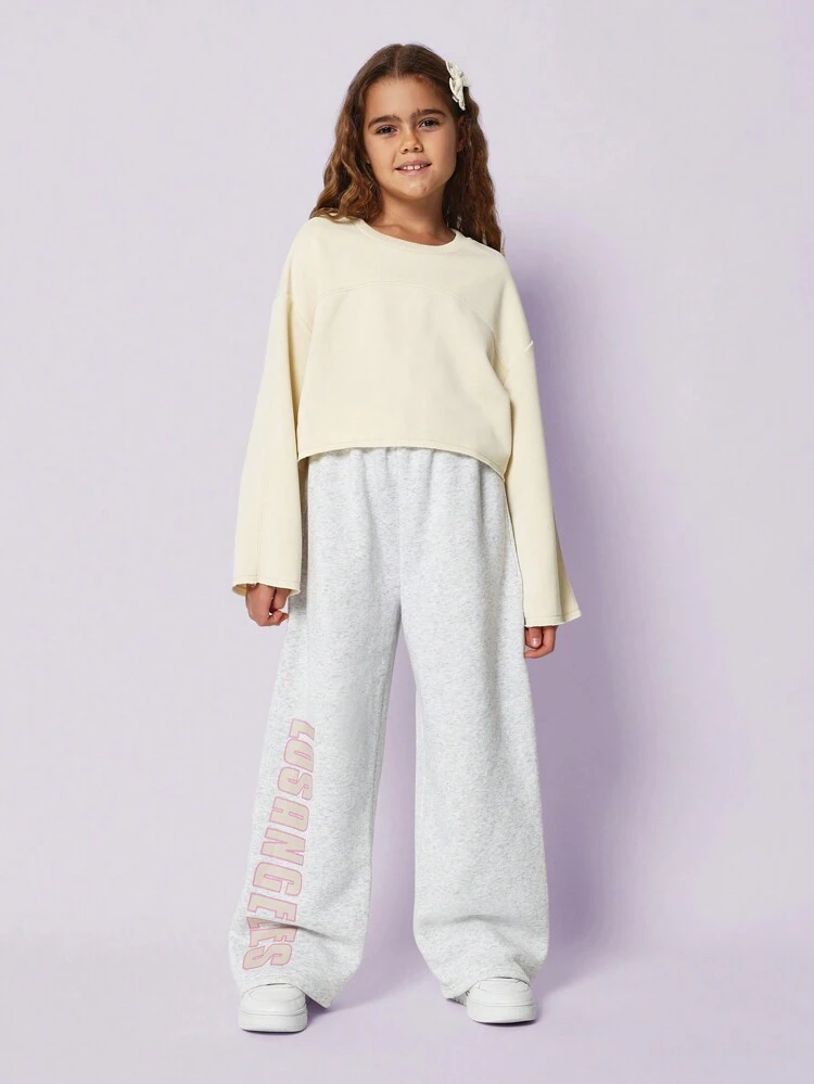 ツイーンガールズ用フレアスリーブ ロー エッジ裾スウェットシャツ