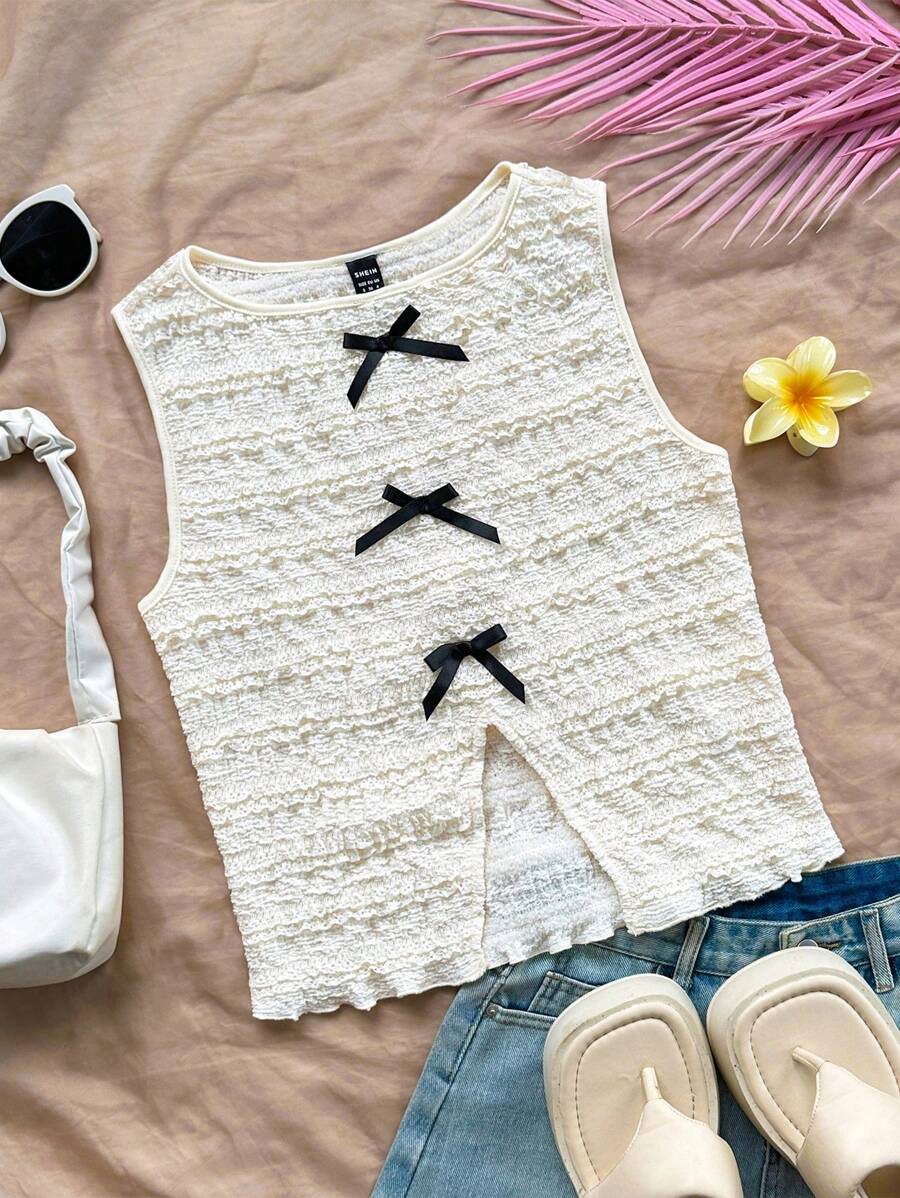 Soleia Top sin mangas de punto texturizado beige con lazo decorativo en la parte delantera y trasera con aberturas laterales, para fiestas y uso casual en resorts