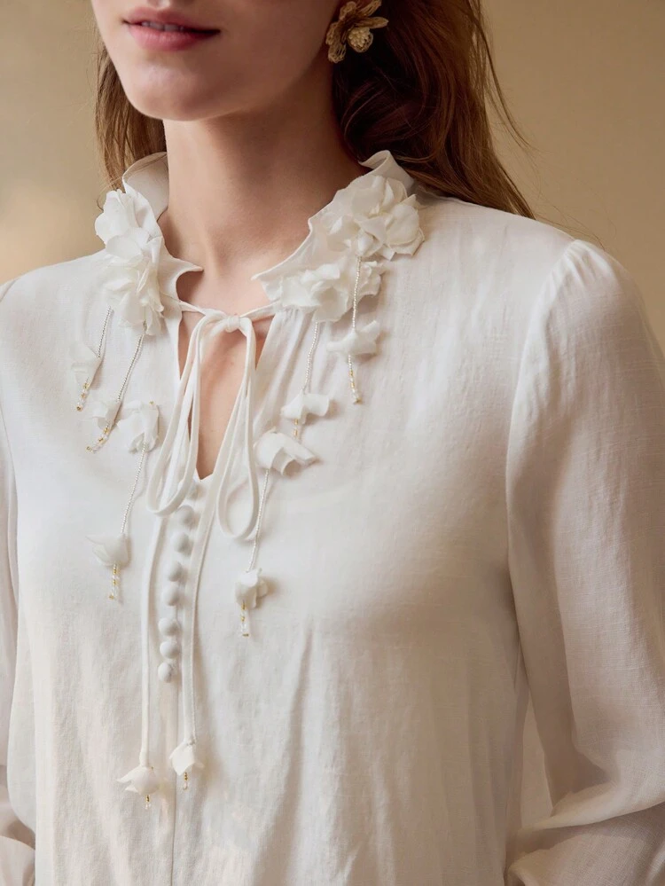 FLORAL APPLIQUED TIE NECK BLOUSE