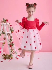 Glamorique Kids Vestido de manga larga con malla con diseño de corazón rojo para niña en el Día de San Valentín. El rojo es el color clásico que representa la pasión y el romance del Día de San Valentín. El patrón de corazón hace eco directo del tema emocional del Día de San Valentín, lo que le da a este vestido una calidez y dulzura visual para la festividad. El diseño de manga larga es adecuado para llevar en las temporadas de primavera y otoño del Día de San Valentín, lo que lo hace práctico y a la moda.