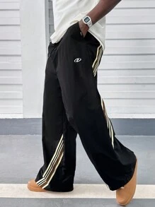 Manfinity RebelGame Pantalones rectos de corte holgado de tela con cinta de ribete para hombres