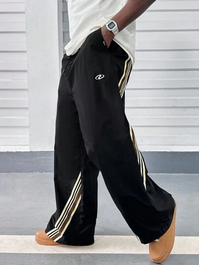 Manfinity RebelGame 男式宽松直筒梭织裤配缎带