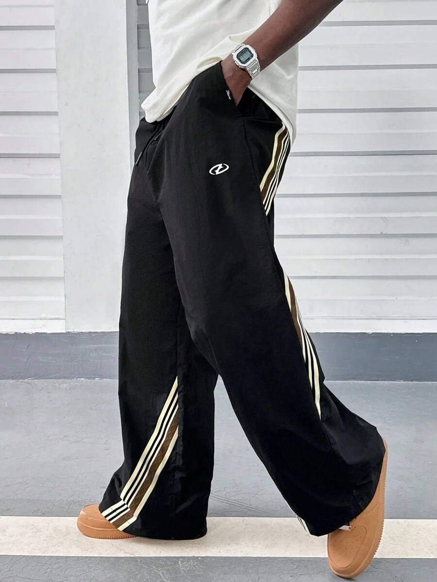 Manfinity RebelGame Pantalones rectos de corte holgado de tela con cinta de ribete para hombres