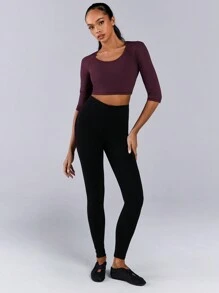 Athîral Top casual deportivo sólido de manga larga, cuello redondo, espalda abierta y diseño sencillo para mujer