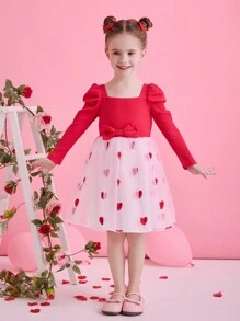 Glamorique Kids Vestido de manga larga con malla con diseño de corazón rojo para niña en el Día de San Valentín. El rojo es el color clásico que representa la pasión y el romance del Día de San Valentín. El patrón de corazón hace eco directo del tema emocional del Día de San Valentín, lo que le da a este vestido una calidez y dulzura visual para la festividad. El diseño de manga larga es adecuado para llevar en las temporadas de primavera y otoño del Día de San Valentín, lo que lo hace práctico y a la moda.