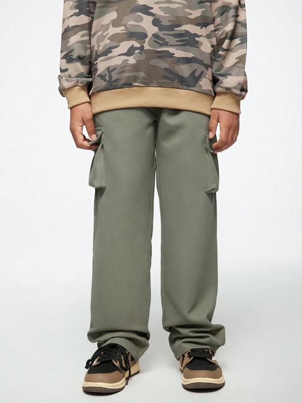 SHEIN Pantalón cargo casual holgado de unicolor para niño preadolescente, apto para uso diario, escuela, reuniones, skateboarding y juego