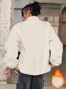 Manfinity Streetrush Chaqueta de manga larga con cremallera frontal, detalle gráfico con letras y empalme de color liso para hombres