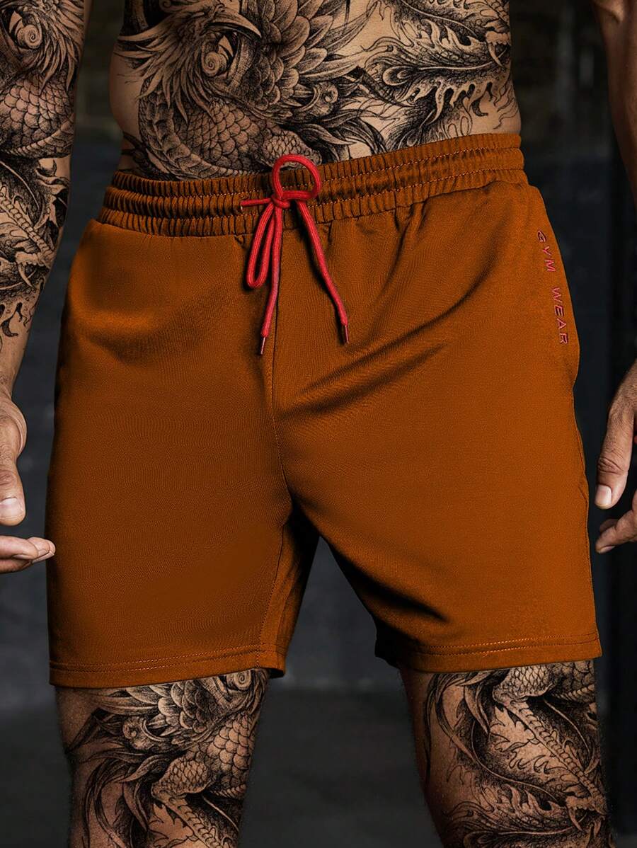 Gym Rark Pantalones cortos deportivos casuales sencillos para hombres con cordón delantero, bordado de letras y unicolor - Óxido marrón - Ver 1