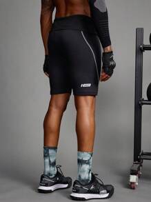 Manfinity Sport Corelite Mallas de compresión deportivas para hombre con estampado de letras y cintura con cordón, estilo novio