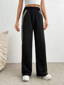 SHEIN Tall Pantaloni neri a gamba larga con dettagli leopardati sulla pancia - nero - Visualizzare 3