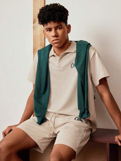 SHEIN Explorewe Set de 2 piezas de estilo universitario informal para adolescentes: Camisa polo de manga corta con patrón elegante y pantalones cortos con cordón en la cintura - Nuevo estilo preppy para primavera/verano