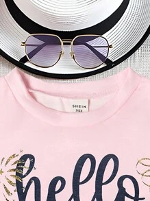 SHEIN Kinder (klein) T-Shirt, Mädchen Frühlings-/Sommerbekleidung, Rundhals Pullover T-Shirt, weißes süßes Sonnenmotiv, Lässig, bequem locker geschnitten, Lustiger Grafik-Muster, Neujahrsstimmung, Feuerwerksblitz, glitzernde Partikel, 2025 FROHES NEUES JAHR, passende Familienoutfits