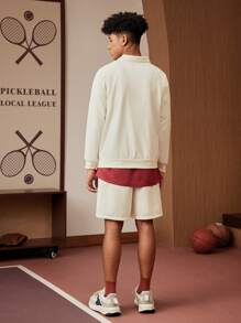 SHEIN Explorewe 青少年男孩两件套：纯色 Polo 领长袖运动衫，带有运动图案印花和配套运动短裤，适合春夏季的休闲日常穿着 - 杏色 - 查看 2