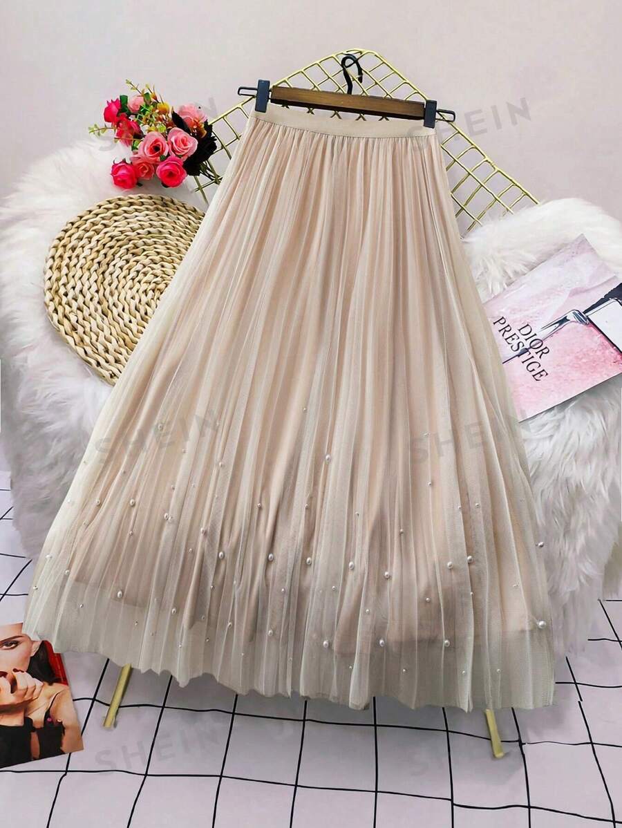 SHEIN LUNE Falda de longitud hasta la rodilla de unicolor, de tela de malla, con decoración de perlas, elegante para uso diario y fiestas, para Navidad y días festivos - Albaricoque - Ver 1