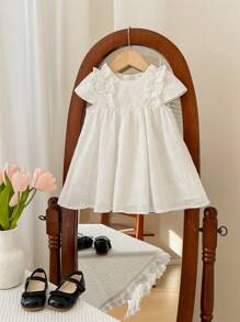 SHEIN Baby Girl Summer Cute Solid Color Embroidered Hollow Out Ruffle Hem Sleeveless Dress - White - View 1