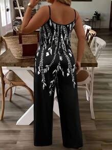 SHEIN LUNE Mono minimalista casual de talla grande para mujer con estampado de flor blanca sobre fondo negro de punto para el verano