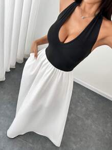 Flirla Robe trapèze noire avec insert en tricot à col montant, patchwork en tissu blanc tressé plissé, poches. minimaliste élégante pour le quotidien, le travail, les invités de mariage, la remise des diplômes, le printemps, l'été, pour femmes