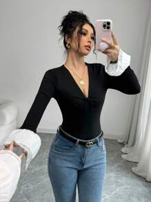 Calvaya Camiseta de manga larga con cuello en V, diseño de contraste de puño partido y cruzado en unicolor, para primavera/otoño