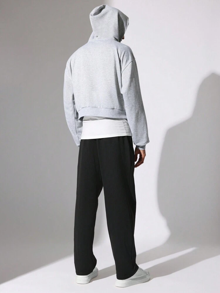 Completo da casa con felpa con zip corta e pantaloni jogger