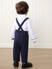 男婴绅士服装套装包括衬衫和背带裤，衬衫采用褶皱和装饰边设计，时尚、优雅、舒适，专为宝宝的正式场合（如婚礼、生日派对、家庭聚会）打造，展现宝宝独特的绅士风格 - 彩色 - 查看 2