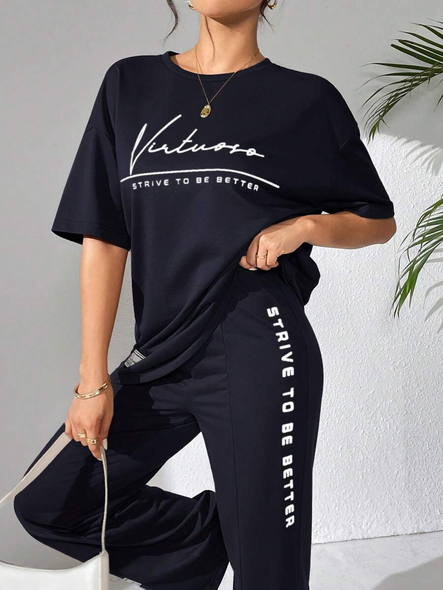 Mulvari 女士夏季口号印花落肩 T 恤和休闲裤 2 件/套，休闲装运动服 2 件套休闲套装，适合散步/运动/返校和日常休闲装 - 藏蓝色 - 查看 1