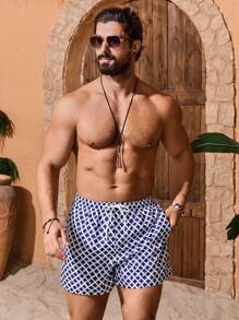 Manfinity Swimmode Shorts de playa con bolsillo delantero con cordón y estampado completo para hombres, casual de vacaciones, hawaiano