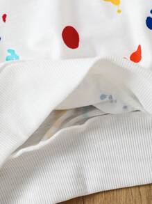 SHEIN Sự kết hợp giữa phong cách đường phố và sức sống mùa xuân cho cô gái trẻ. Trang phục được phủ họa tiết chữ cái tiếng Anh và graffiti trắng, toát lên phong cách đường phố mạnh mẽ. Họa tiết chữ cái mang đến nét thời trang quốc tế, trong khi các chi tiết graffiti thể hiện nét cá tính và nét nghệ thuật. Thiết kế tay dài mang đến sự ấm áp vừa đủ cho tiết trời xuân se lạnh. - trắng - Xem 4