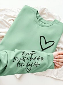 INAWLY Áo nỉ cổ tròn tay dài in chữ tiếng Anh và hình trái tim cỡ lớn dành cho nữ, tốt nghiệp, trở lại trường, tốt nghiệp, giáo viên dành cho nữ, áo chui đầu trở lại trường mùa thu đông thu - màu xanh lá - Xem 1